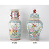 Danny's Fine Porcelain Lidded Jar with Vivid Green Ground and Colorful Floral Design.