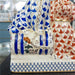 Danny's Fine Porcelain Home Decor Danny's Fine Porcelain Twin Spaniel Dogs with Drum – Blue & Red Fishnet