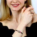 Michal Golan Jewelry Michal Golan Medium pink evil eye bracelet with teal crystal center & edges on leather strap, handmade at Michal Golan Studios USA