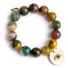 PowerBeads by jen Jewelry Average 7" Chartreuse agate paired with a bronze hammered evil eye