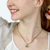 Michal Golan Small gold evil eye necklace with crystal center on double strand chain, handmade at Michal Golan Studios USA