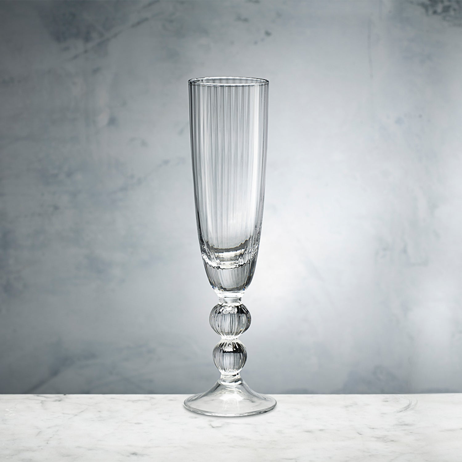 https://shoptheaddison.com/cdn/shop/products/beatriz-ball-beatriz-ball-glass-venice-champagne-flute-set-of-4-clear-28625155227699.jpg?v=1642866560