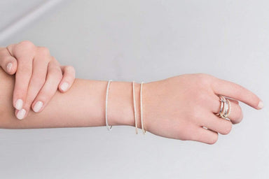Crislu Jewelry CRISLU Flex Tennis Bracelet Finished in 18KT Gold